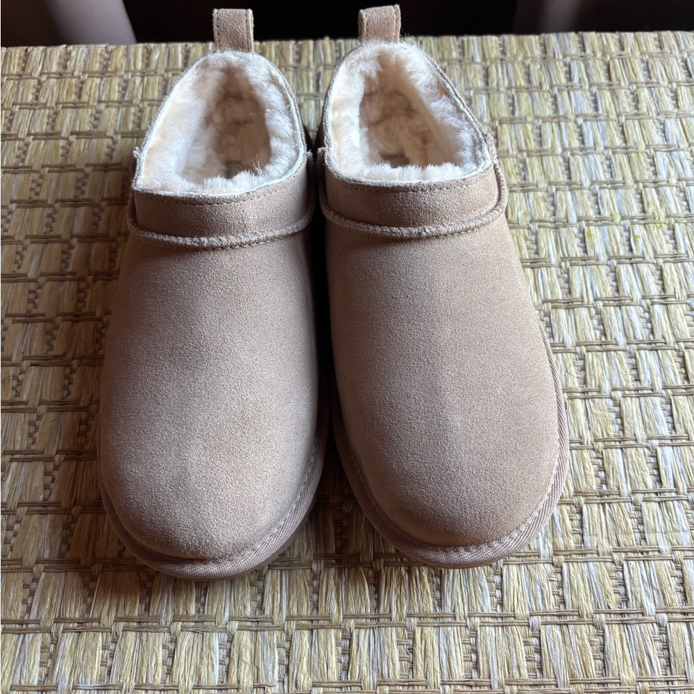 Ugg size 4  - sand. NEVER WORN